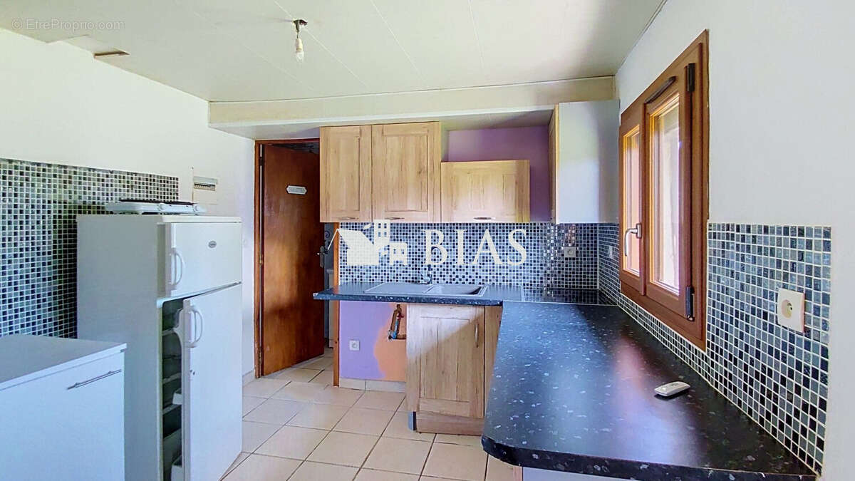 Maison 90 m² à Bourg-Achard  - photo 6