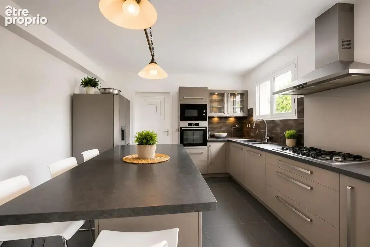 Une maison familiale avec jardin - 122 m² - Monnaie - photo 7