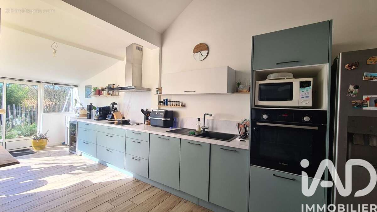 Maison 110 m² à Benassay  - photo 2