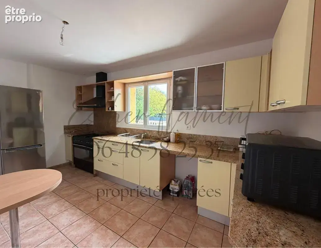 Maison familiale avec piscine ,forage, chambre de plain-pied et terrain de 1 600 m² à Saint-Hilaire-de-Brethmas - photo 12