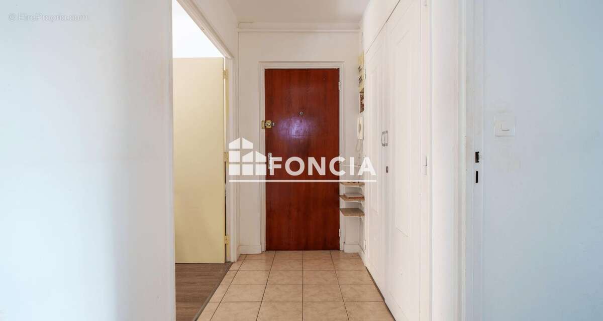 Appartement T3 de 64 m² avec balcons, parking et cave – Rue Casimir Rançon - photo 2