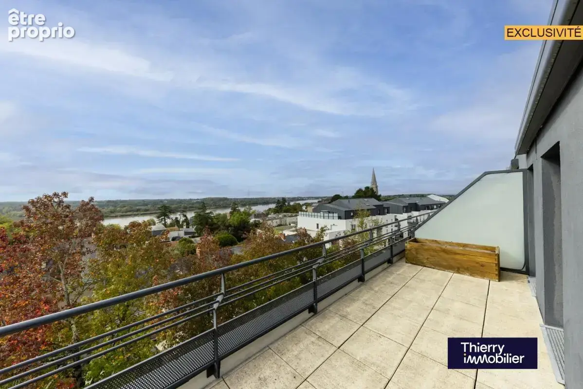 Superbe t3 couëron bourg - vue imprenable sur la loire - photo 12