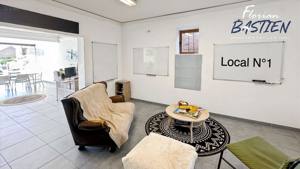 Immeuble en centre-ville – 3 lots – 27 000€/an - photo 13