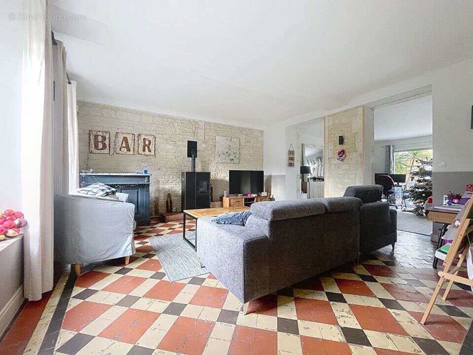 Maison à LOUVIGNY