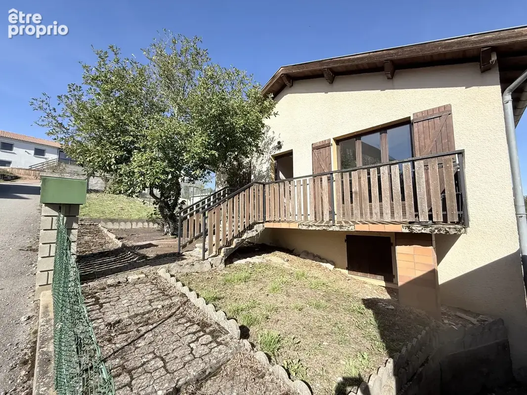 Maison sur deux niveaux avec terrain et garage - photo 2