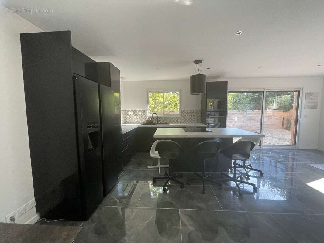 Maison 115 m² à Villeneuve-Tolosane  - photo 5