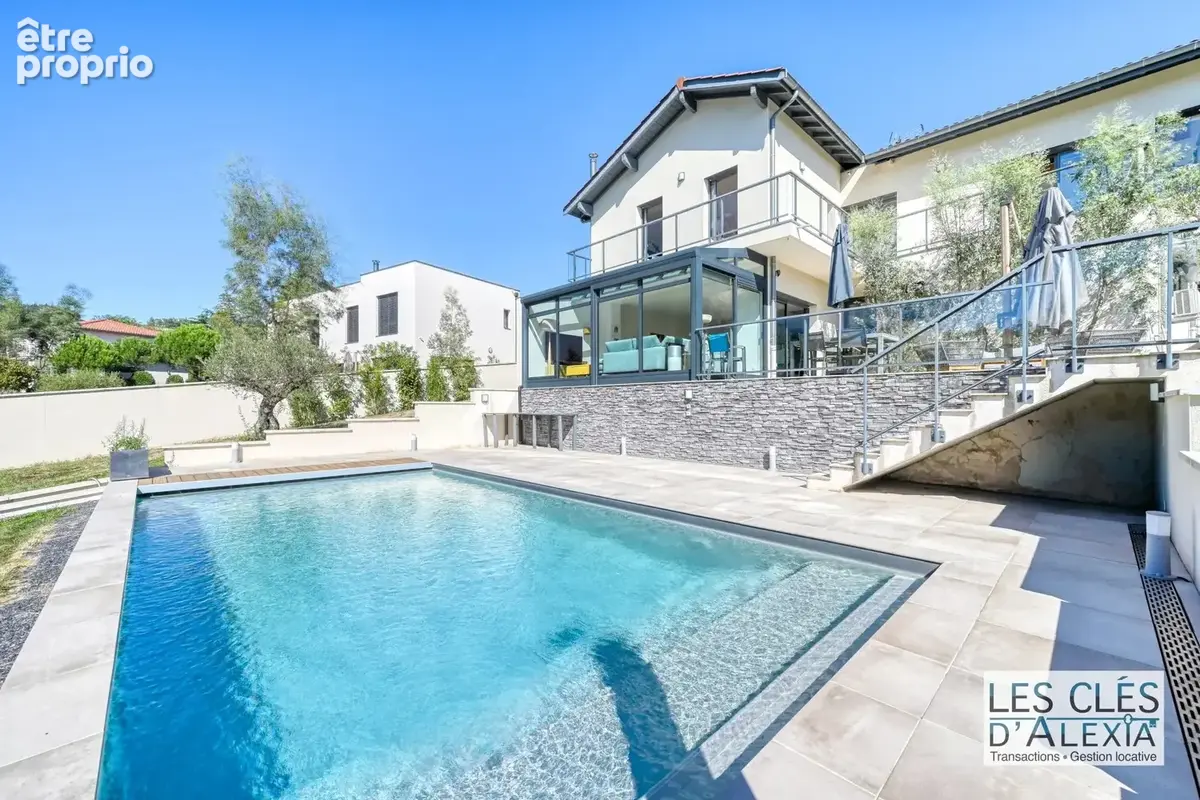 Saint-didier-au-mont-d’or — somptueuse maison contemporaine avec piscine  203 m²  terrain 2 134 m² - photo 5