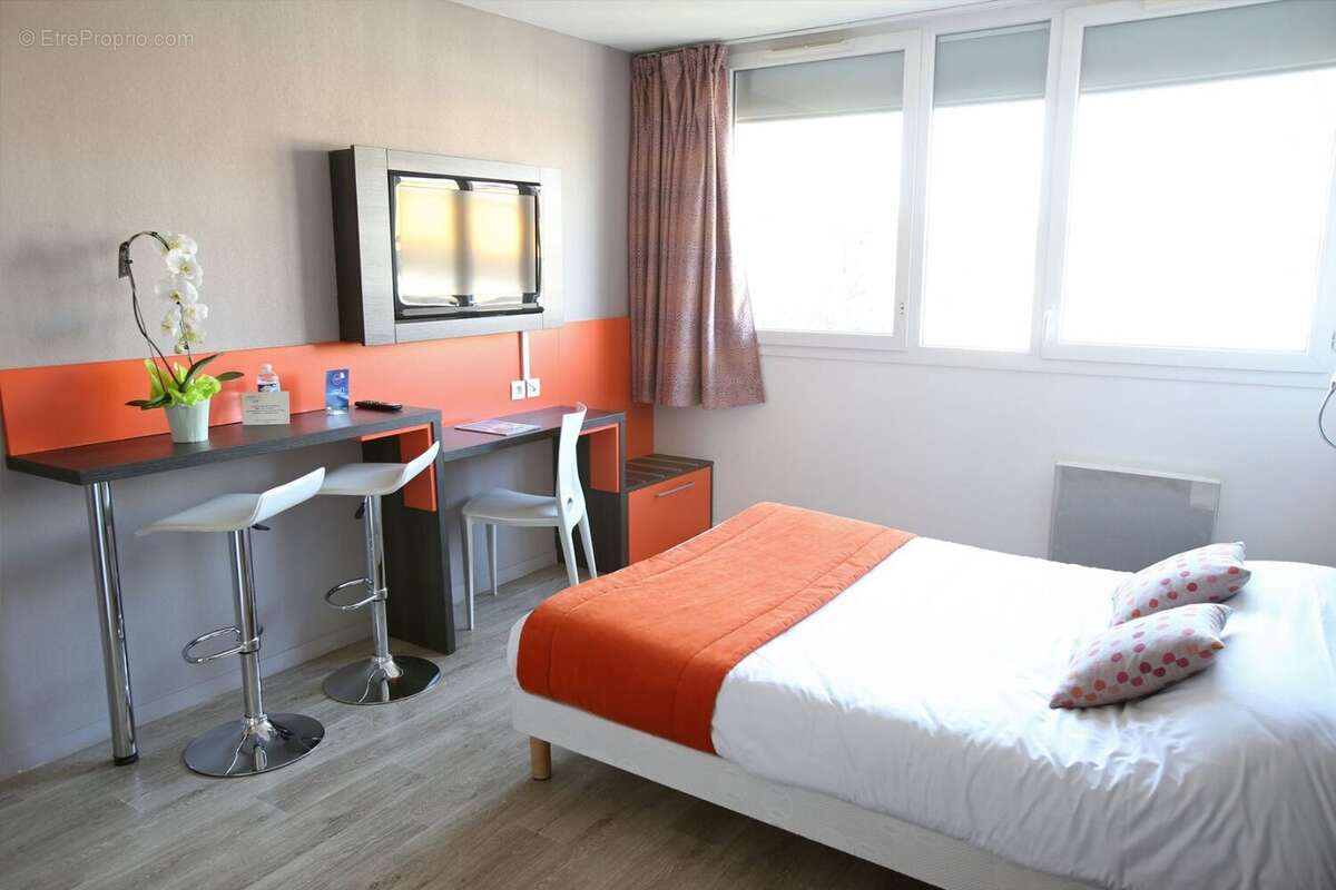 INVESTISSEMENT LOCATIF  CHEVILLY-LARUE  Résidence d'Affaires Adonis Paris Sud *** - 7,37% de rentabilité - photo 3