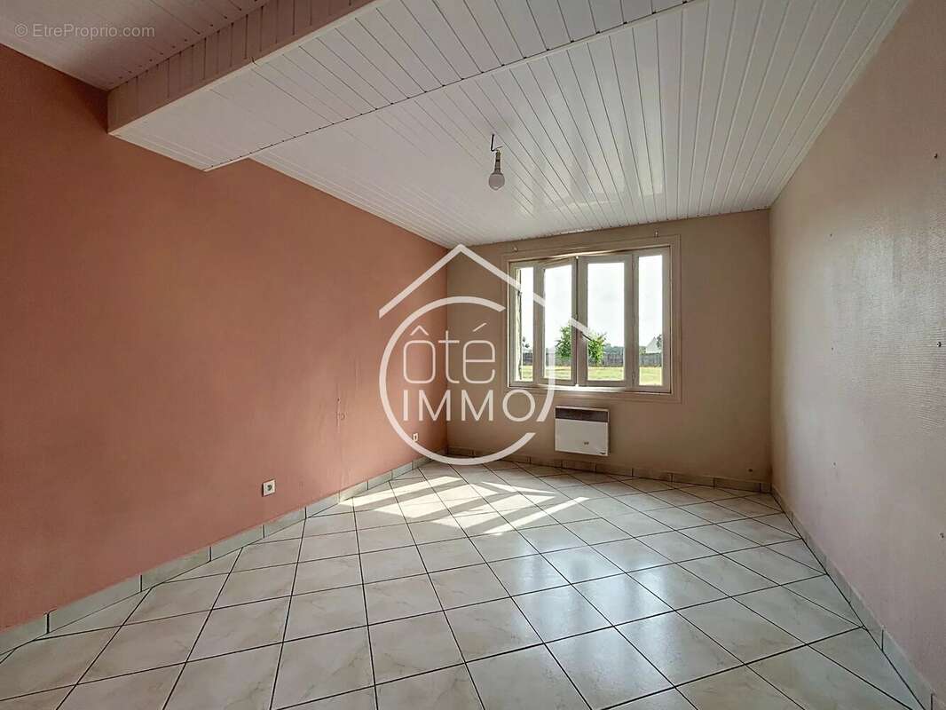 Flaujagues : Maison de campagne de 110 m² avec jardin, garage et dépendances - photo 6