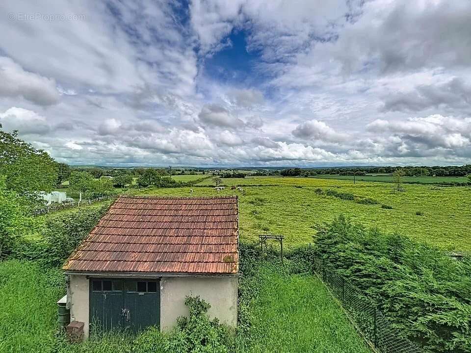 Maison à MANLAY