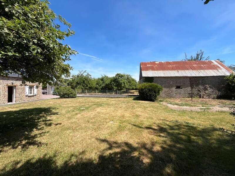 Havre de paix : Maison en pierre rénovée et son verger de 150 pommiers — Rare sur le marché - photo 22