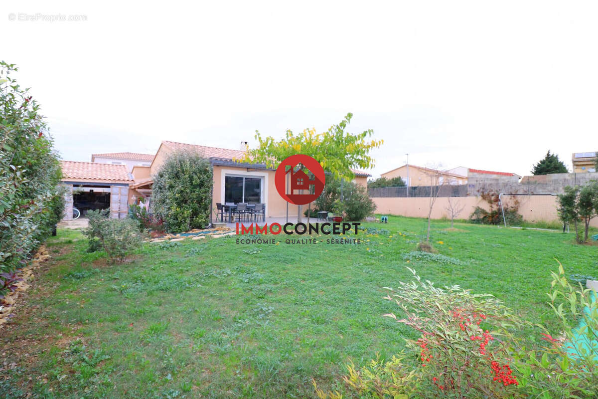 Maison à LAUDUN-L&#039;ARDOISE