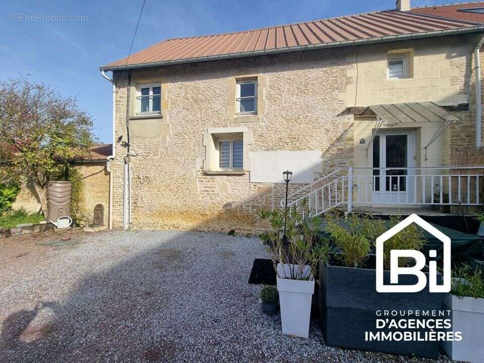 Maison à CAGNY