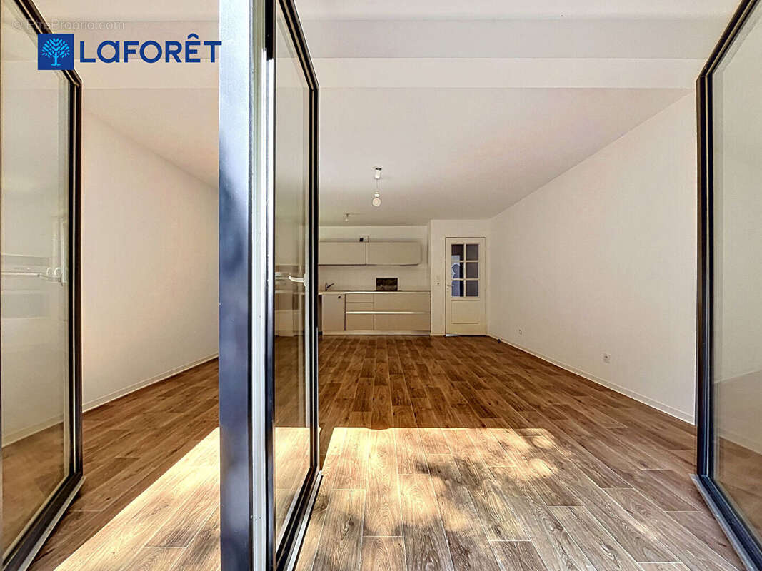Au Centre de Guidel, Appartement 68m²,  2 chambres, terrasse, jardin, 2 stationnements - photo 3