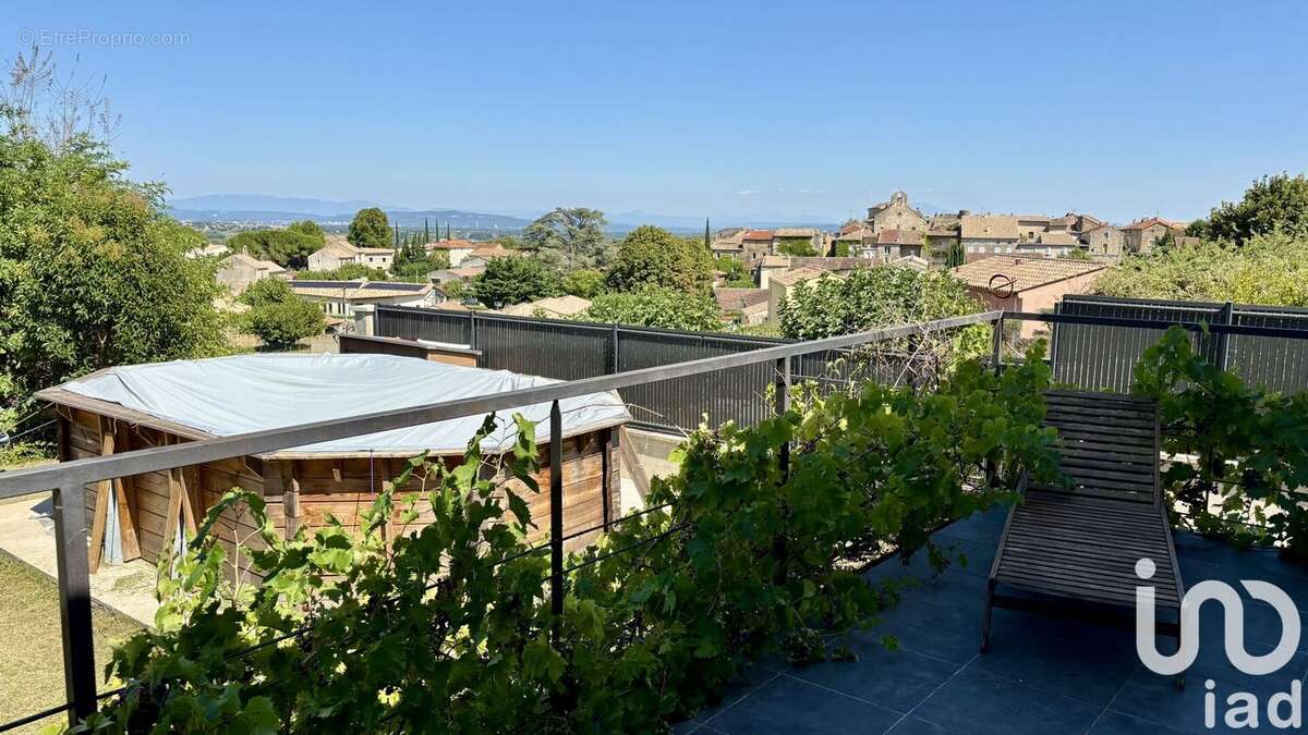 Photo 2 - Maison à SAINT-JULIEN-DE-PEYROLAS