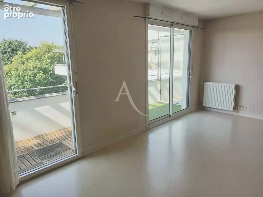 Appartement Carquefou / La Fleuriaye - T3 avec balcon & garage - photo 3