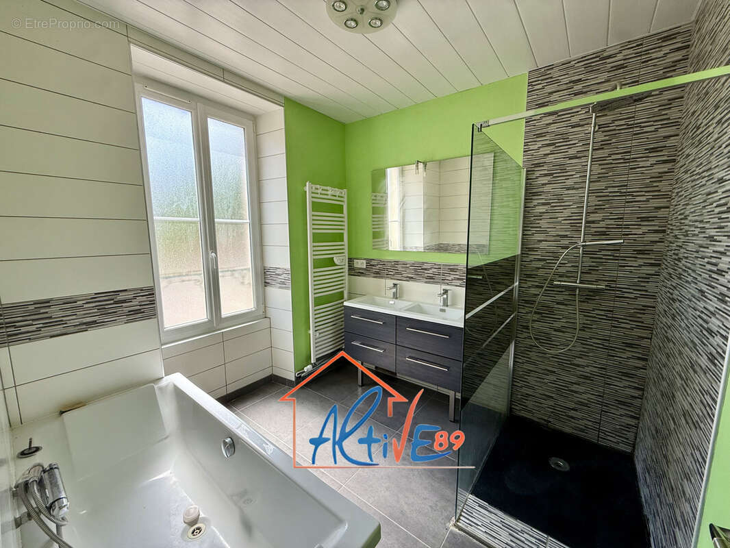 Maison familiale de 187m2 avec 4 chambres et fort potentiel à Bonnard - photo 9