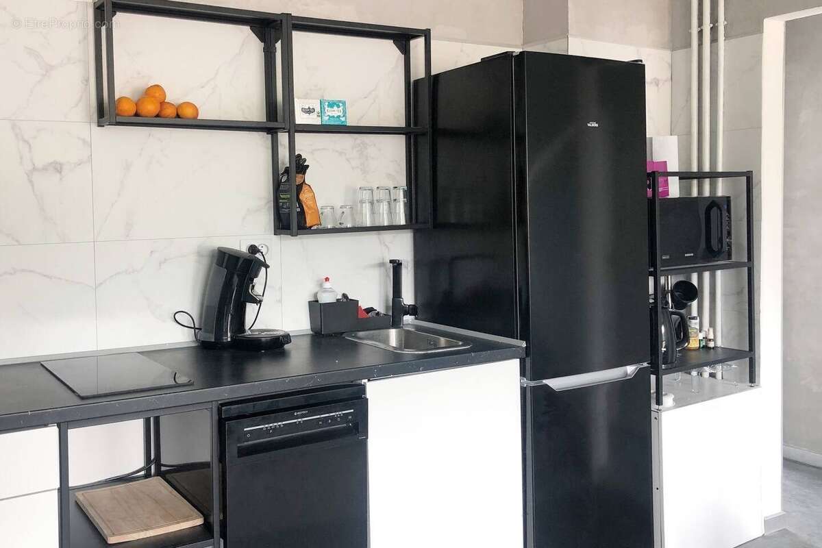 cuisine équipée - Appartement à SAINT-ETIENNE