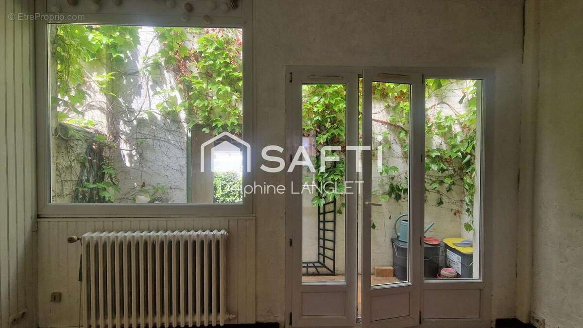Photo 2 - Maison à REIMS