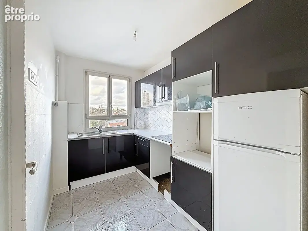Montreuil, au pied du metro croix de chavaux, dernier etage sans vis a vis, 3 pièces avec cave et parking. - photo 3
