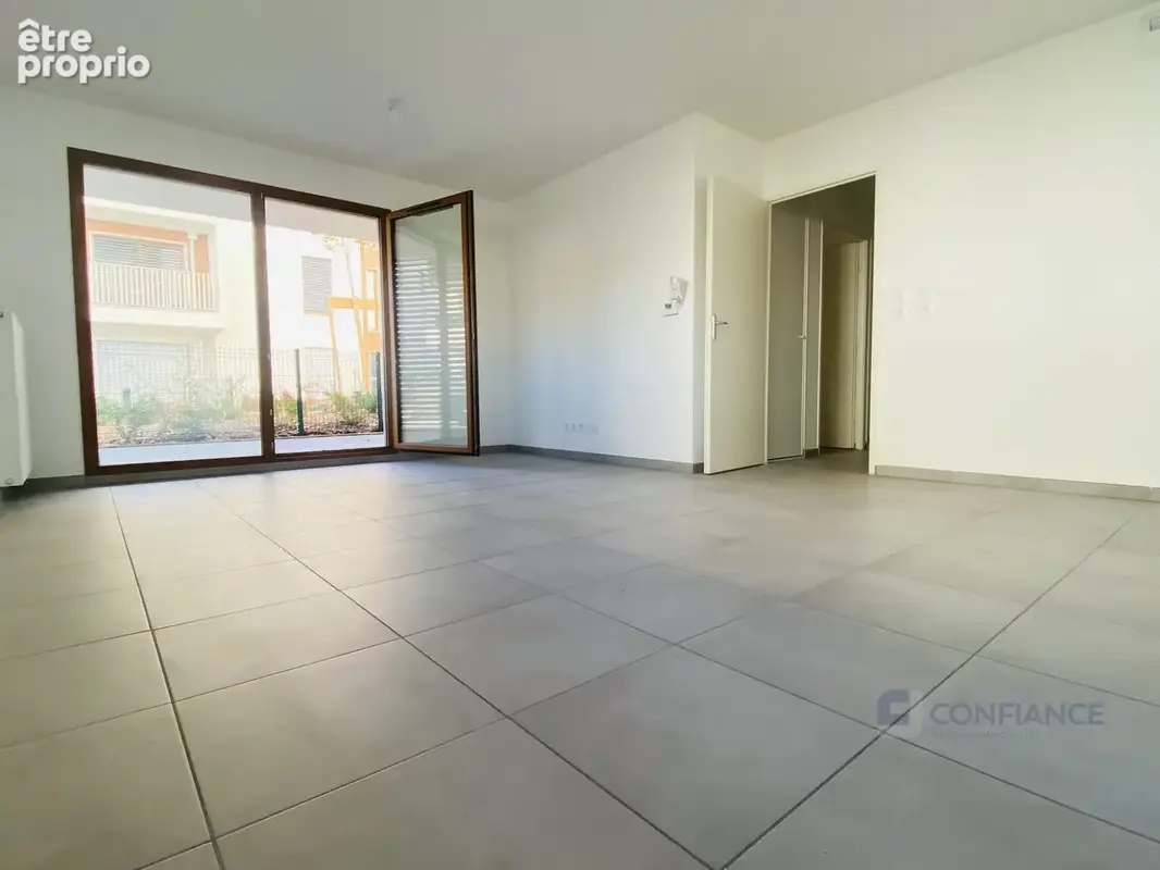Appartement 59 m² à Saint-Priest  - photo 3