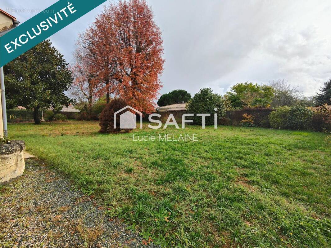 Photo 1 - Terrain à BLANQUEFORT