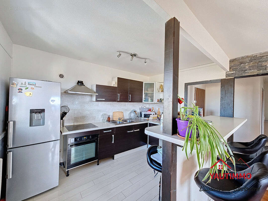 Appartement T2 de 51 m2 avec balcon, cave et parking à Ville-la-Grand - photo 7