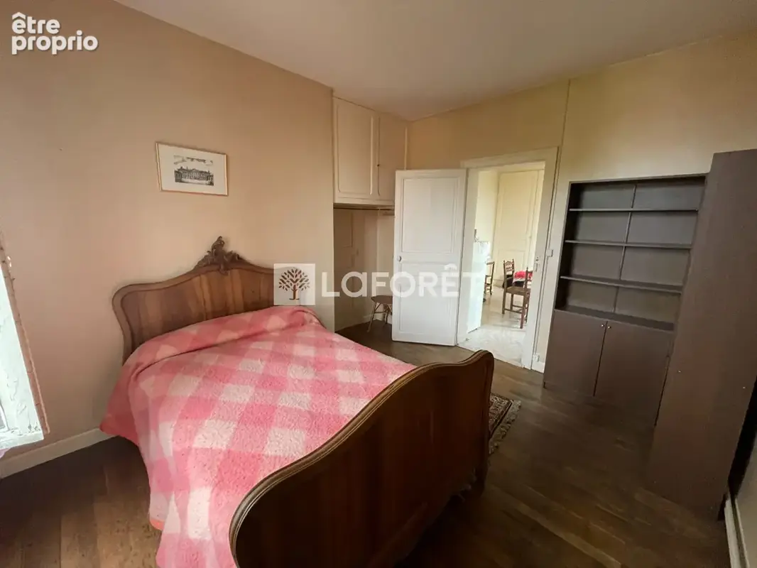 Lons-le-Saunier · Maison de caractère en pierre · 2 logements indépendants · Jardin 770 m² · Idéal investissement ou famille - photo 7