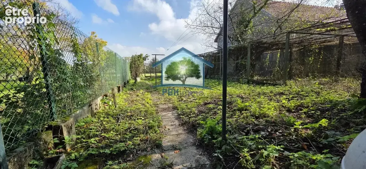 DANNEMARIE (68) - Maison mitoyenne de 7 pièces avec grande grange et terrain constructible - photo 4
