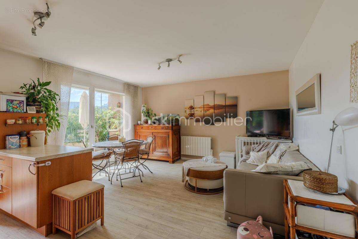 Charmant T3 de 58 m² + 2 terrasses arborées situé en bord de Saône, au sein d'une résidence boisée - photo 4