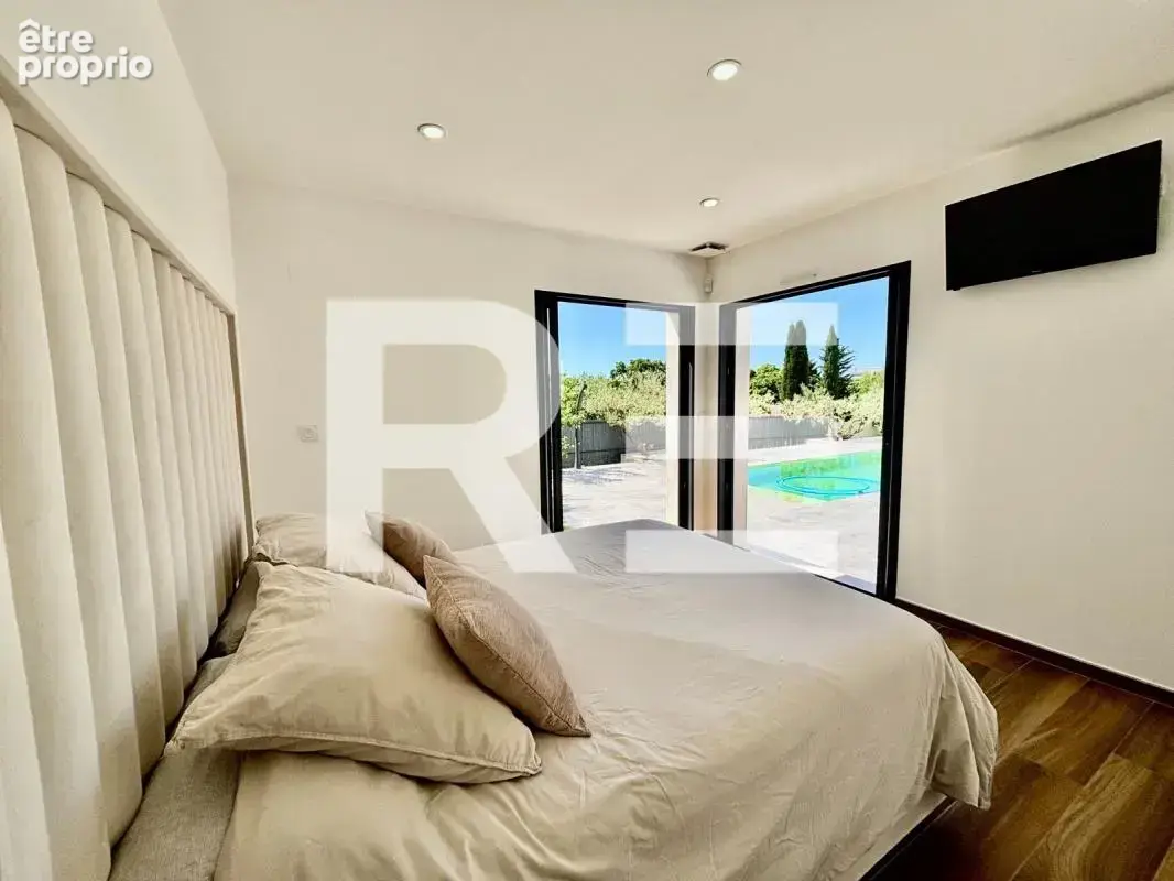 Maison architecte 230m2 sur nimes aec terrain de 2118m2 - photo 8