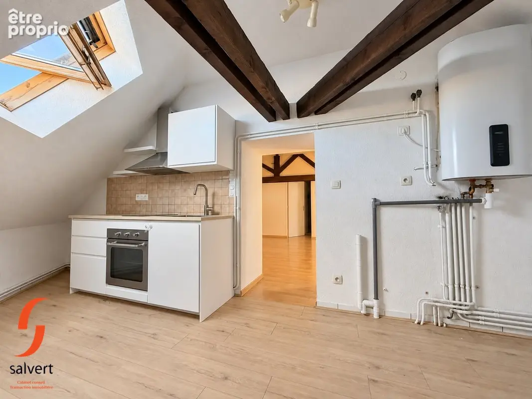 A vendre, Immeuble comprenant 5 appartements et 1 commerce. - photo 12