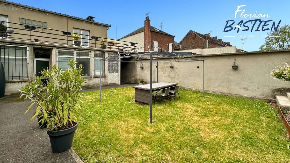 Immeuble en centre-ville – 3 lots – 27 000€/an - photo 10