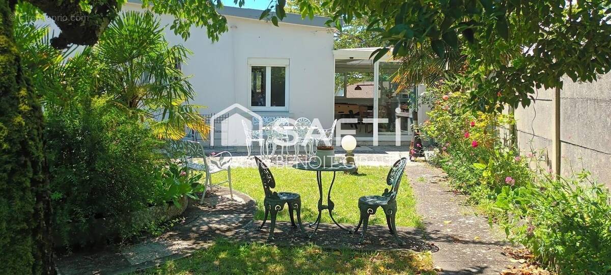 Photo 1 - Maison à SAINTES