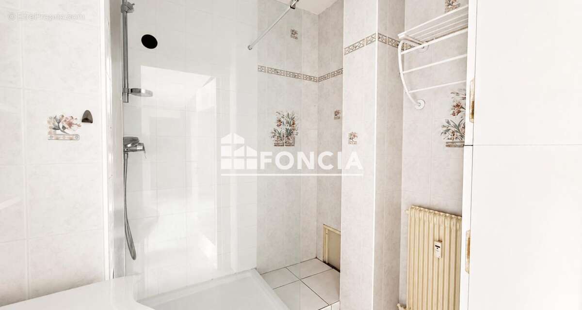 Lyon 3ᵉ – T4 traversant de 75 m² avec 3 chambres - proche commodités - photo 6