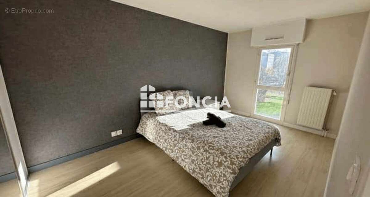 Type 4 avec balcon -  residence récente avec stationnement - photo 11