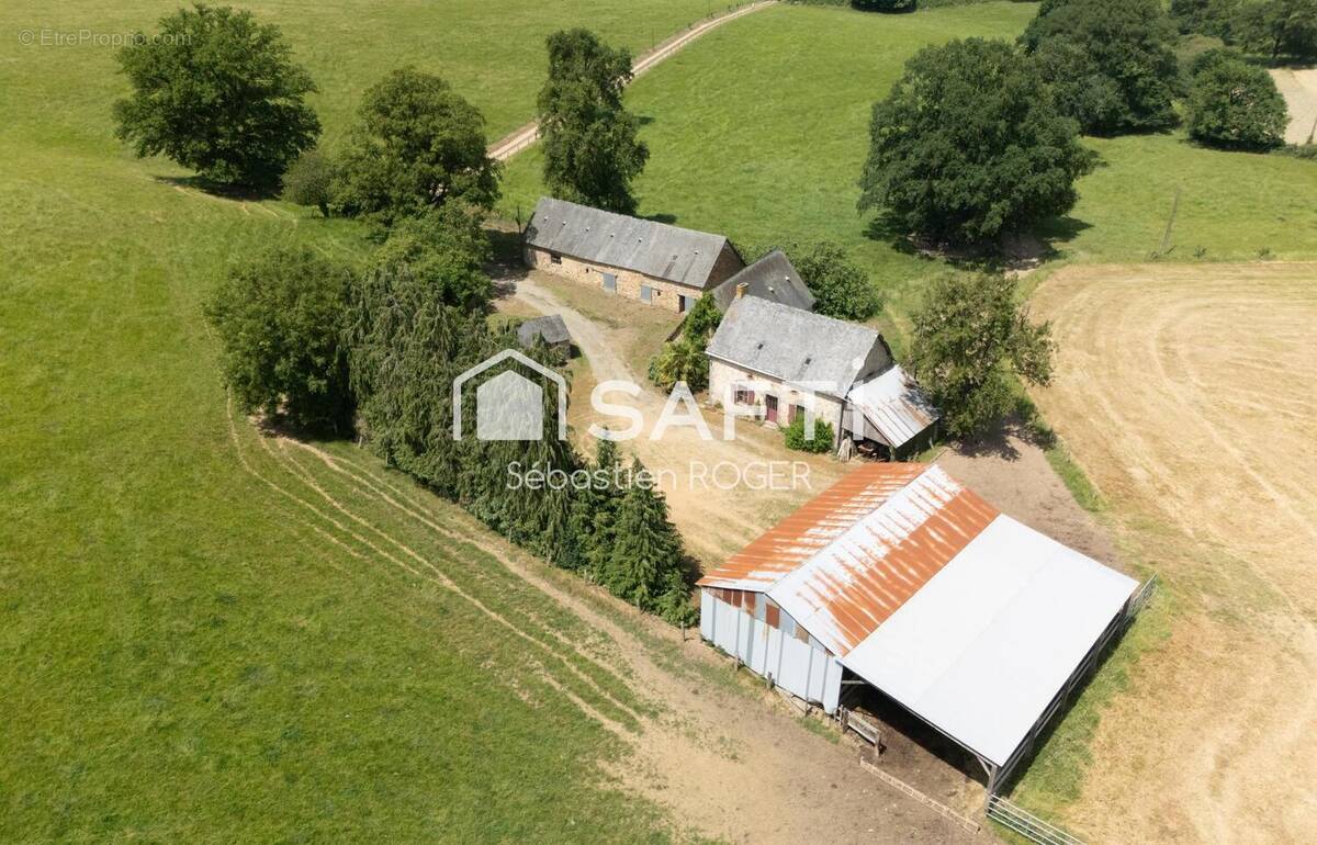 Photo 1 - Maison à SAINT-GEORGES-BUTTAVENT