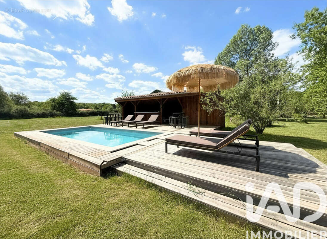 Photo 2 - Maison à ROAILLAN