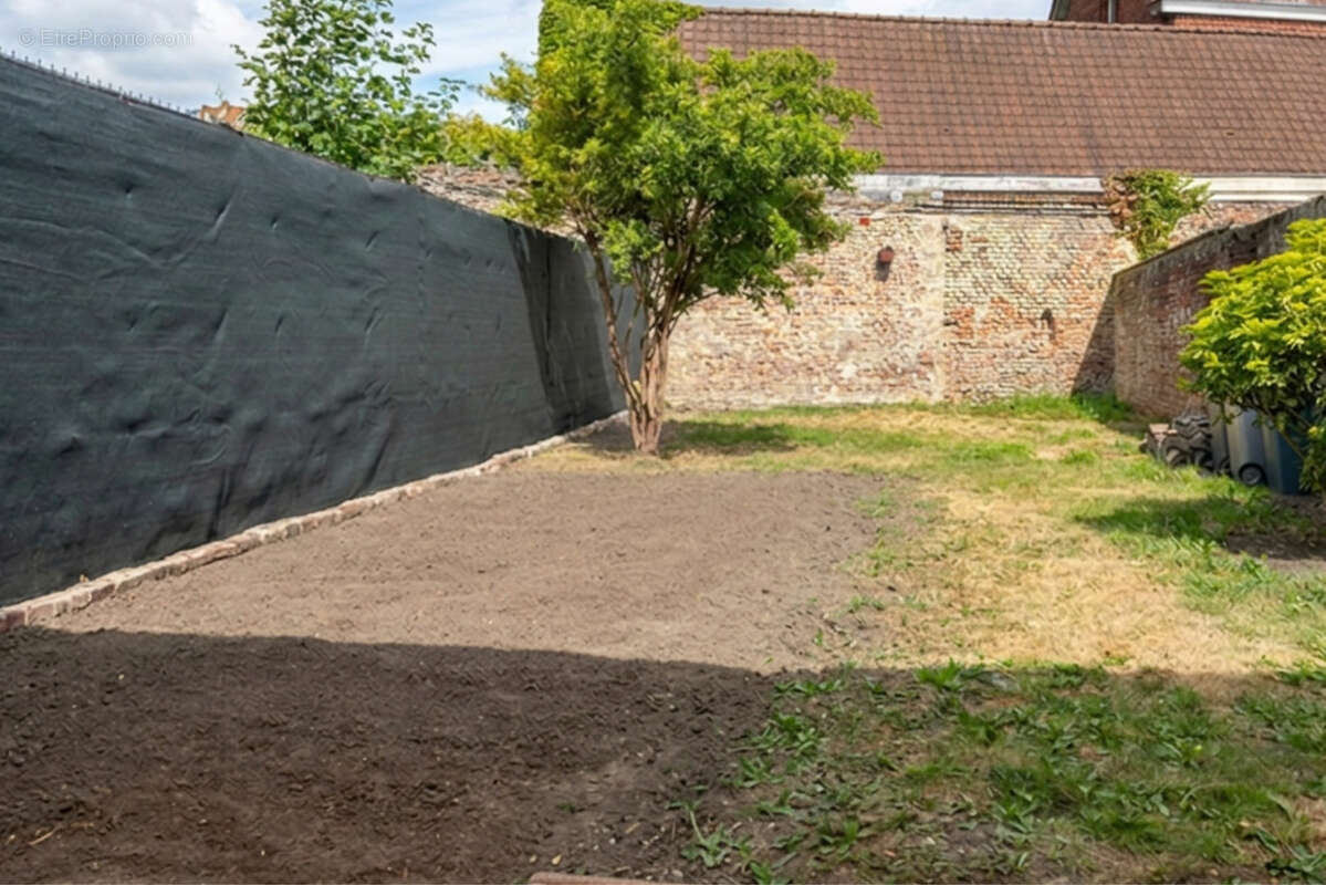Maison mitoyenne avec jardin 59880 Saint-Saulve - photo 11