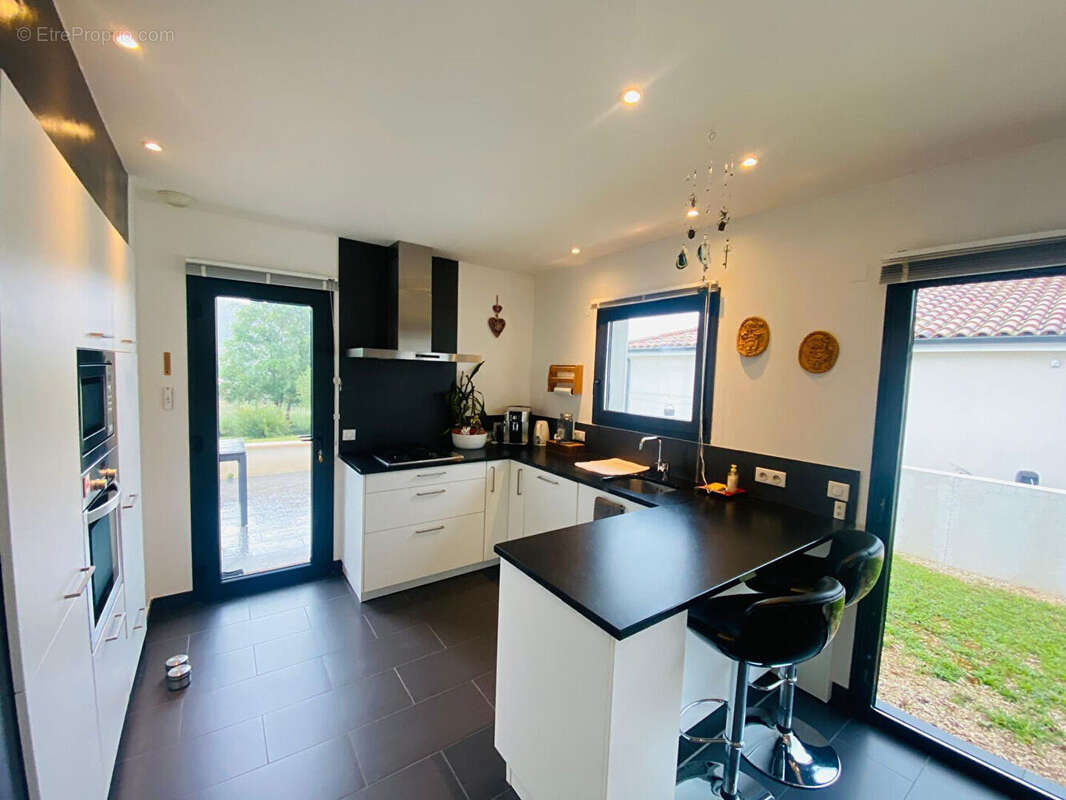 Maison plain-pied 80 m² - photo 4