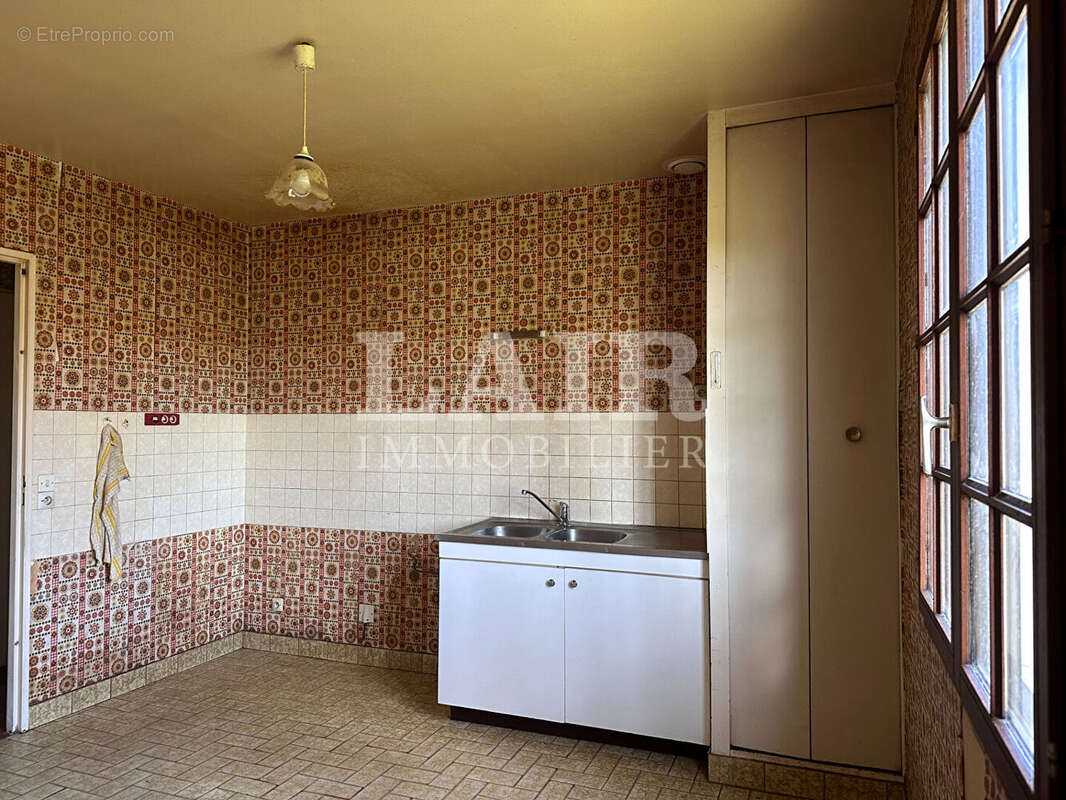 Maison à CONDE-SUR-HUISNE