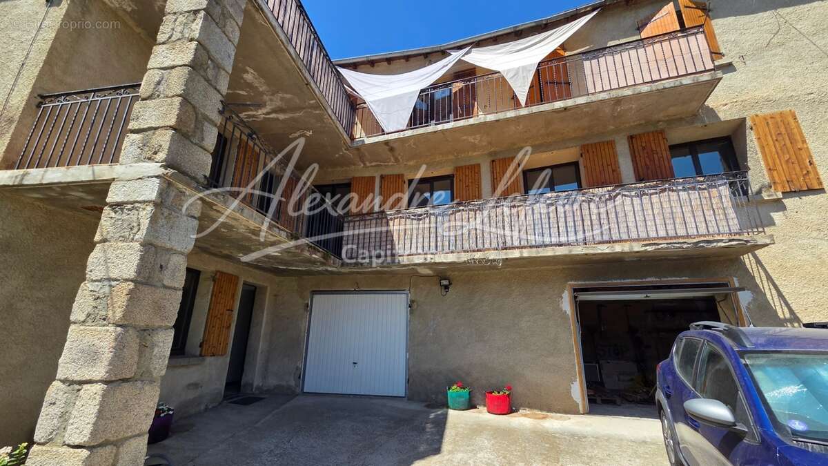 Angoustrine – Appartement T4 rénové avec beaux volumes - photo 12