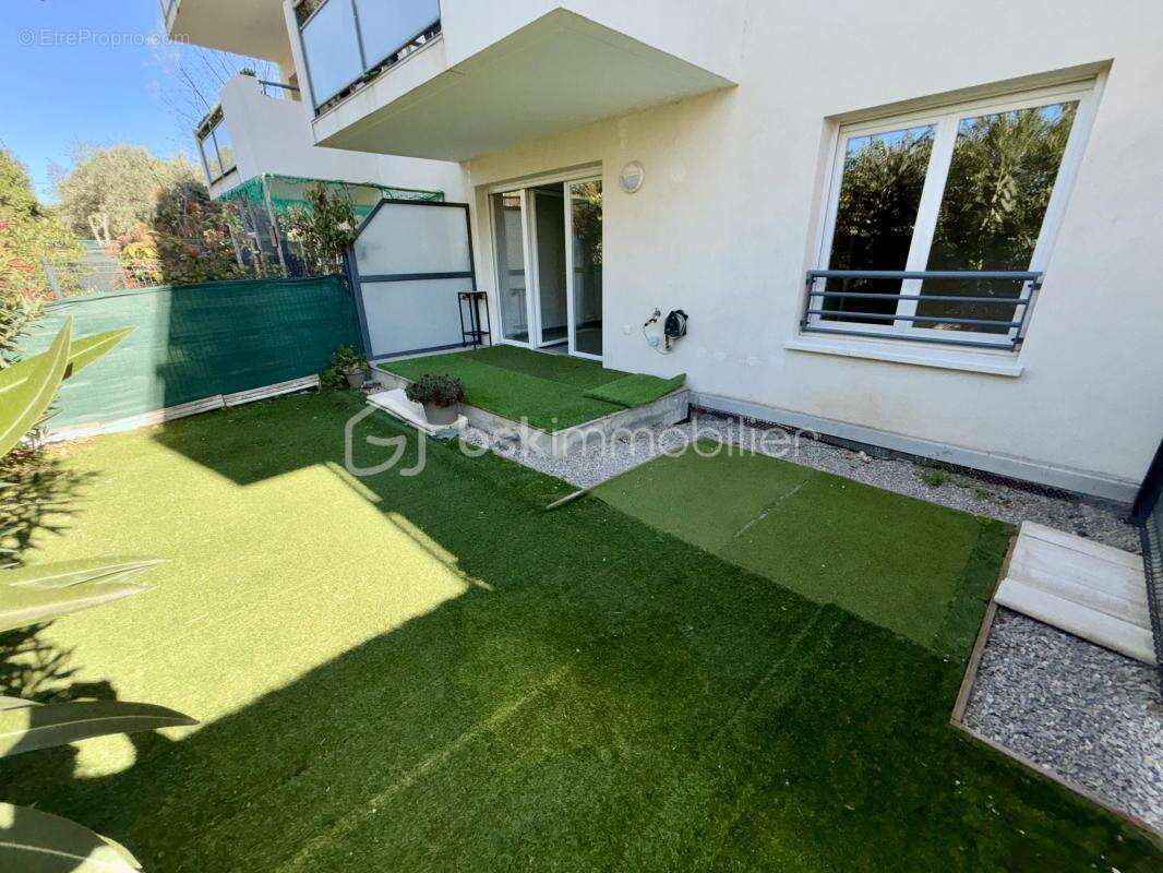 Appartement T2 45 m² avec jardin, terrasse et parking - photo 7
