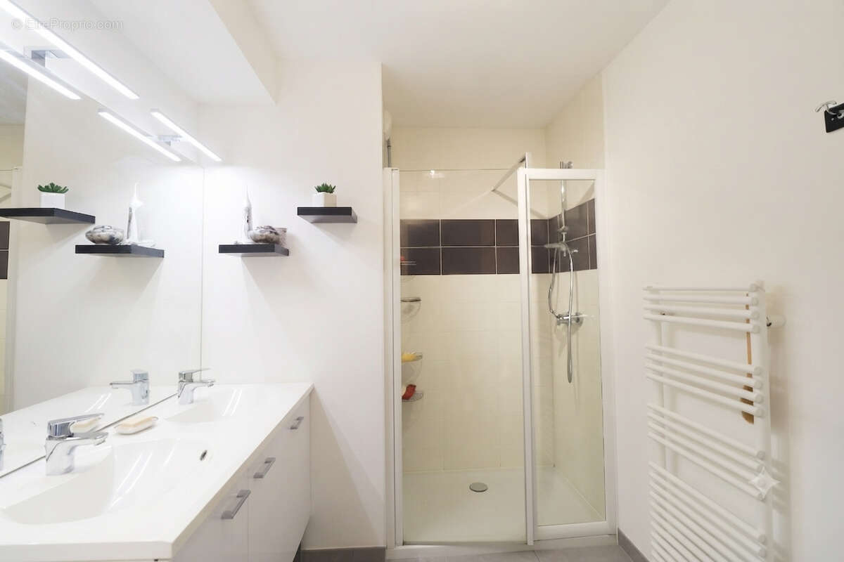 Appartement 75m² à saint-sébastien-sur-loire - photo 7