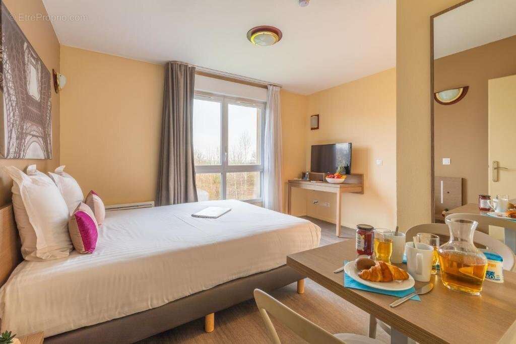 Appartement à MAGNY-LES-HAMEAUX