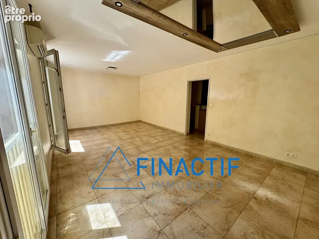 Appartement Type 3/4 - 73,41 m2 - Cave - Garage fermé - photo 2