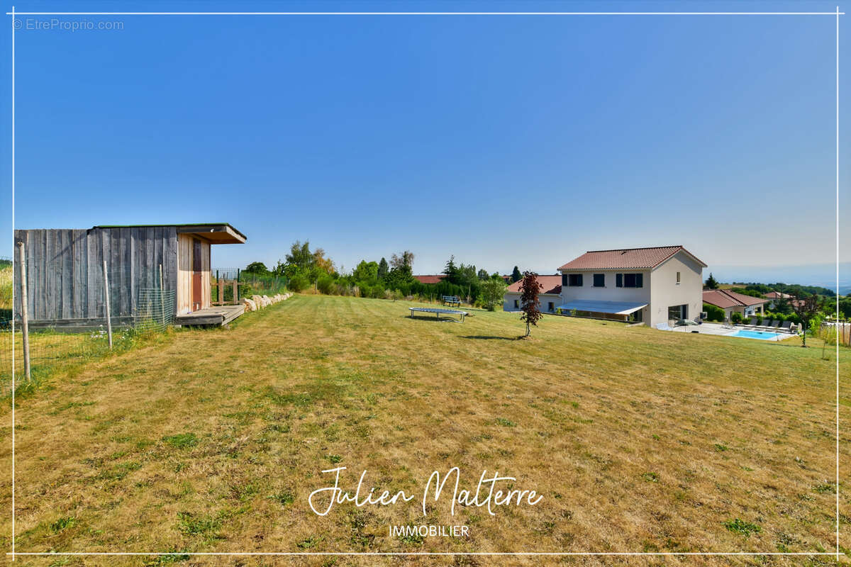 Maison récente de 170 m² sur 2100 m² de terrain préservés, 7 pièces, 5 chambres dont dressing, garage de 85 m² à MAROLS (42) - photo 52