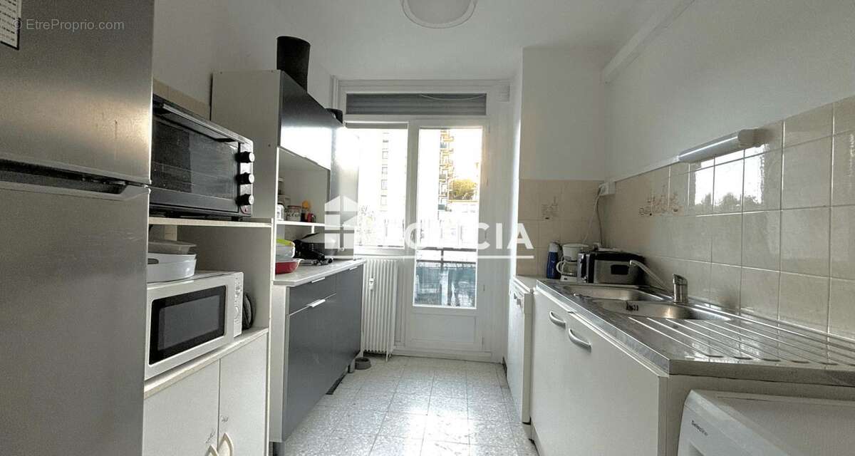 T2 spacieux avec parking et cave - photo 2
