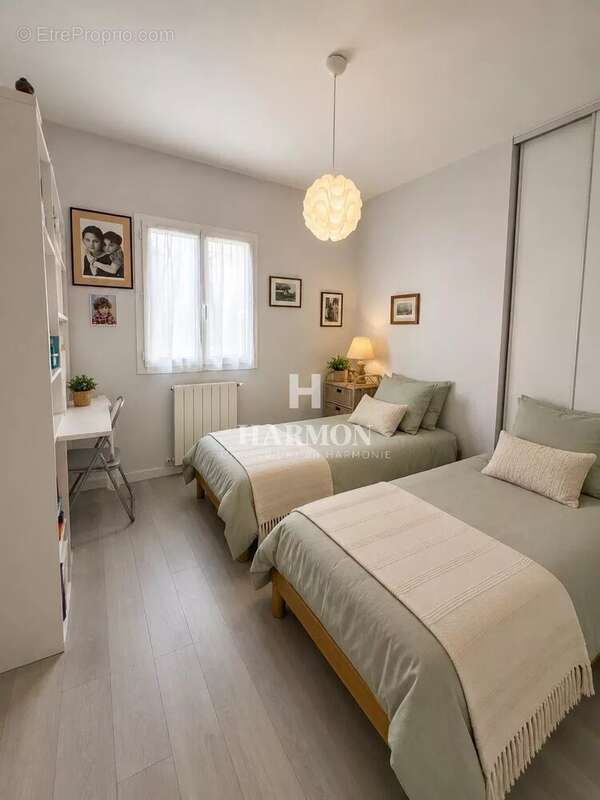 Harmon à vendre :  Élégante maison de plain-pied avec piscine à Pau - photo 13