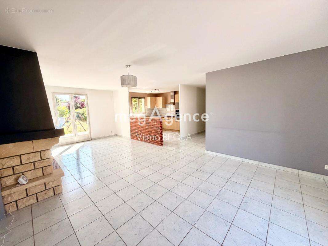 Maison de plain-pied 103 m² – 4 chambres – Garage – Terrain de 1 100 m² - photo 5